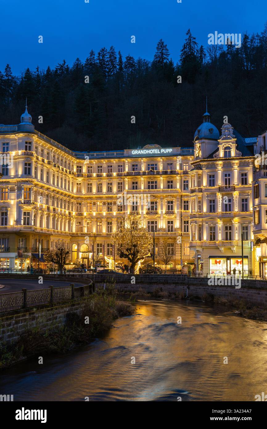 This is a riverside view of Grandhotel Pupp, a famous spa hotel in the town centre on December 23, 2024 in Karlovy Vary, Czech Republic Stock Photo
