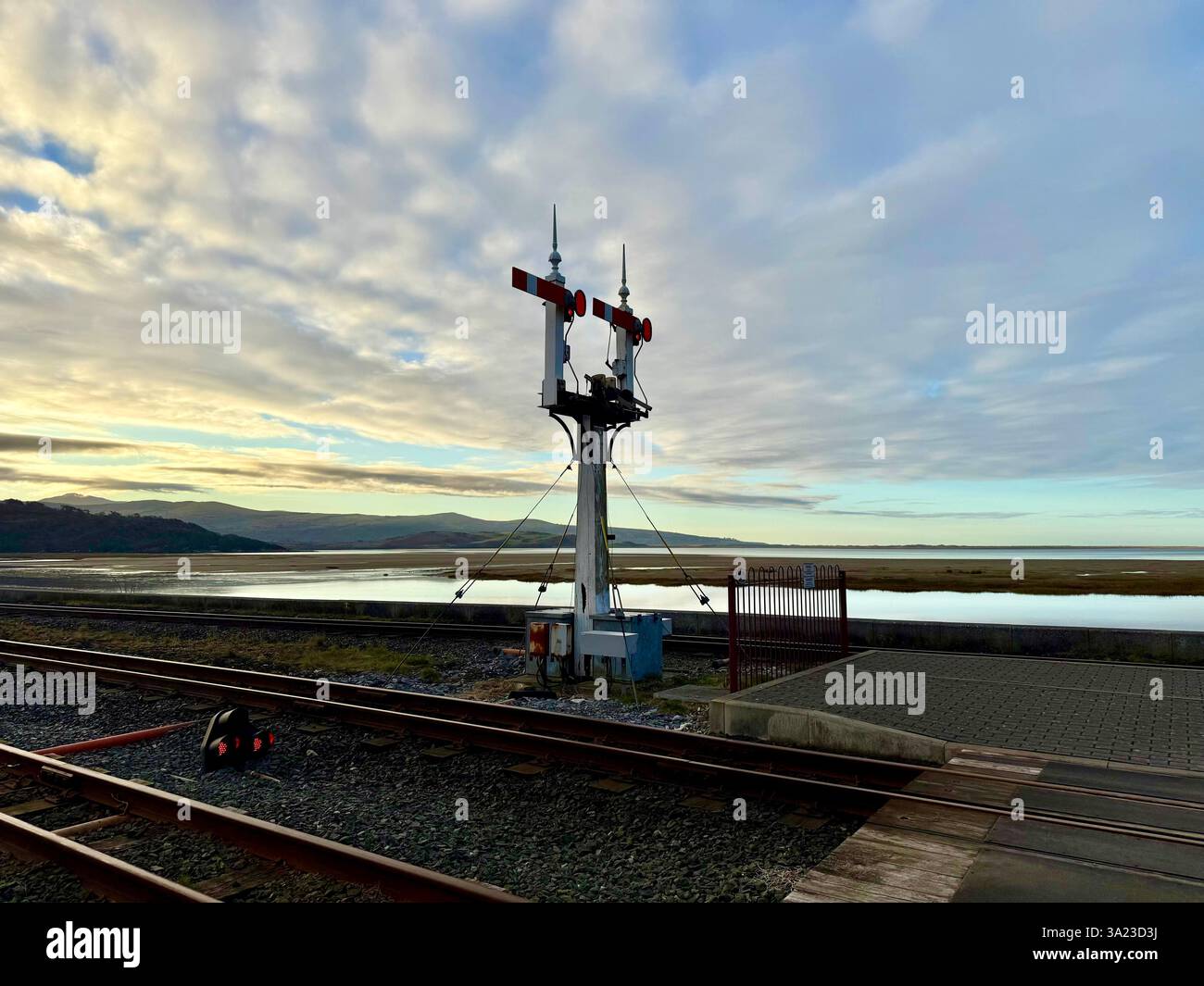 Twin Railway Signal at Dawn on the Ffestiniog Railway near Porthmadog, Gwynedd, Wales - Smartphone Captured Stock Image