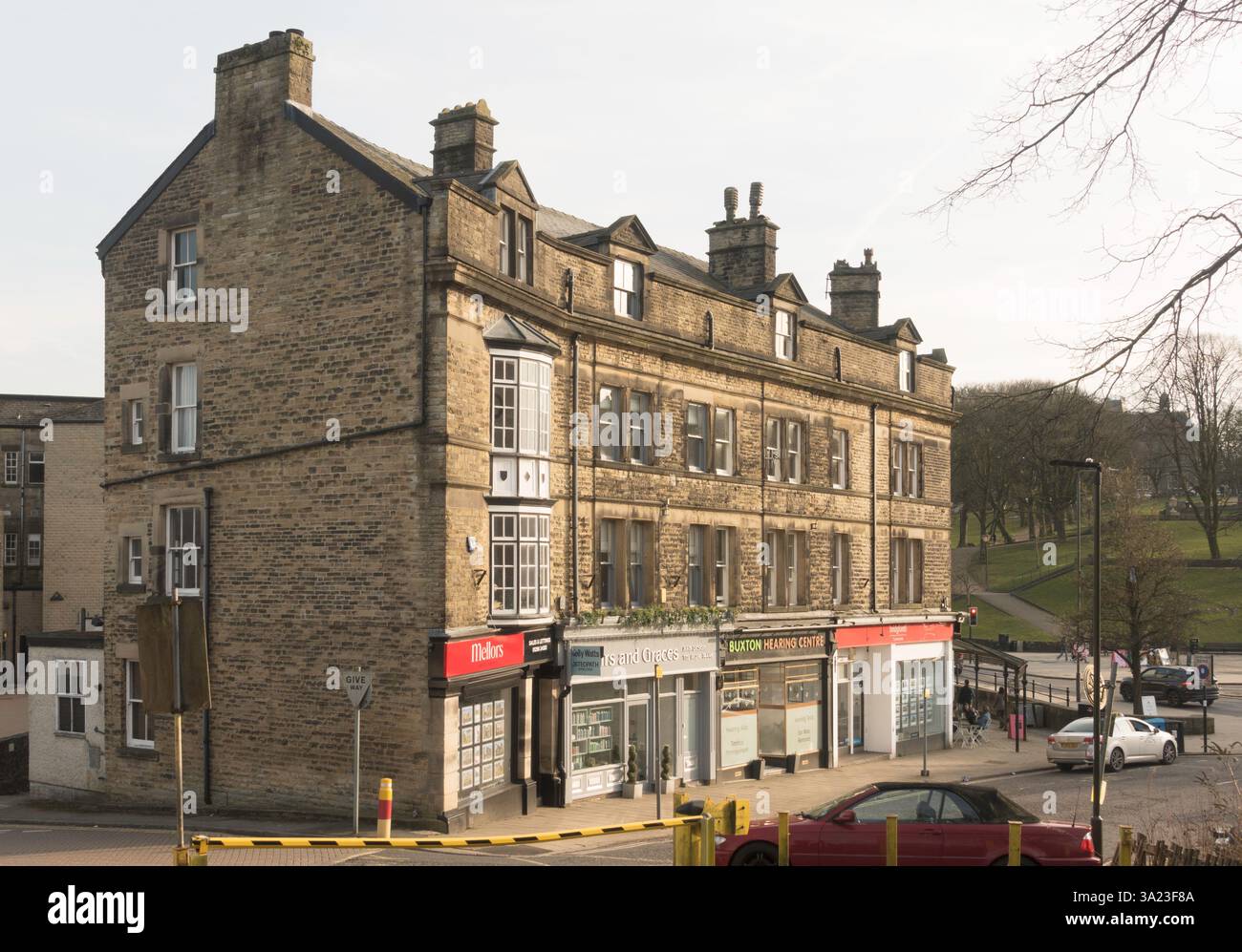 Offices, shops and flats in Grove Parade, Buxton, Derbyshire, England, UK Stock Photo