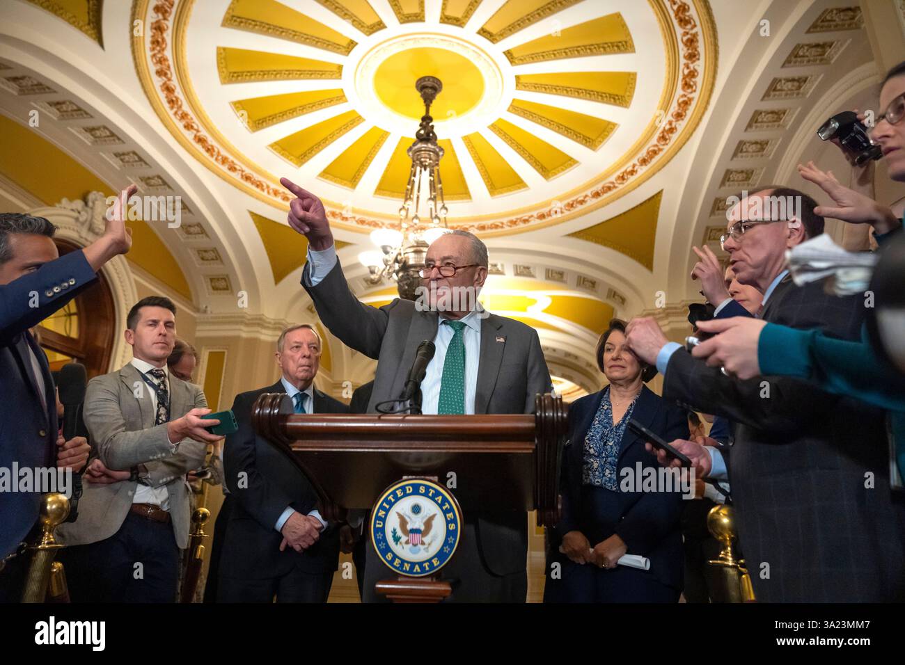 Sen. Charles Schumer, D-N.Y., speaks to reporters after a Senate policy