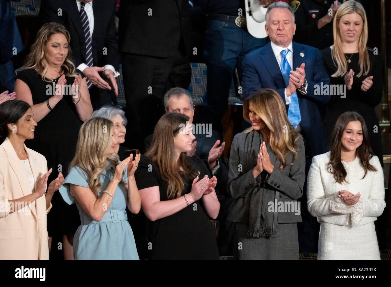 Washington, United States. 11 March, 2025. U.S First Lady Melania Trump, right, applauds her