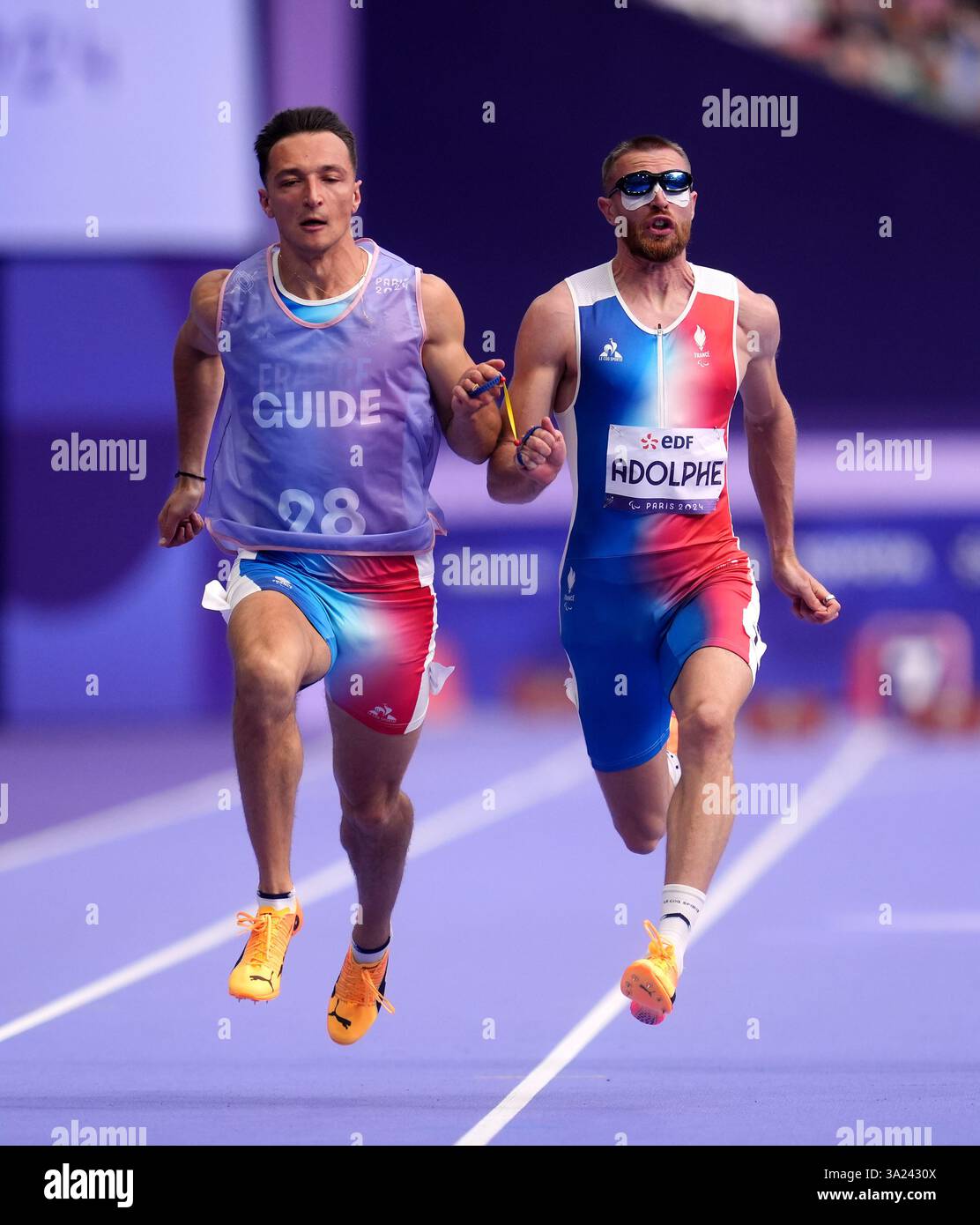 France's Timothee Adolphe competes in the Men's 100m T11 Round 1 ...