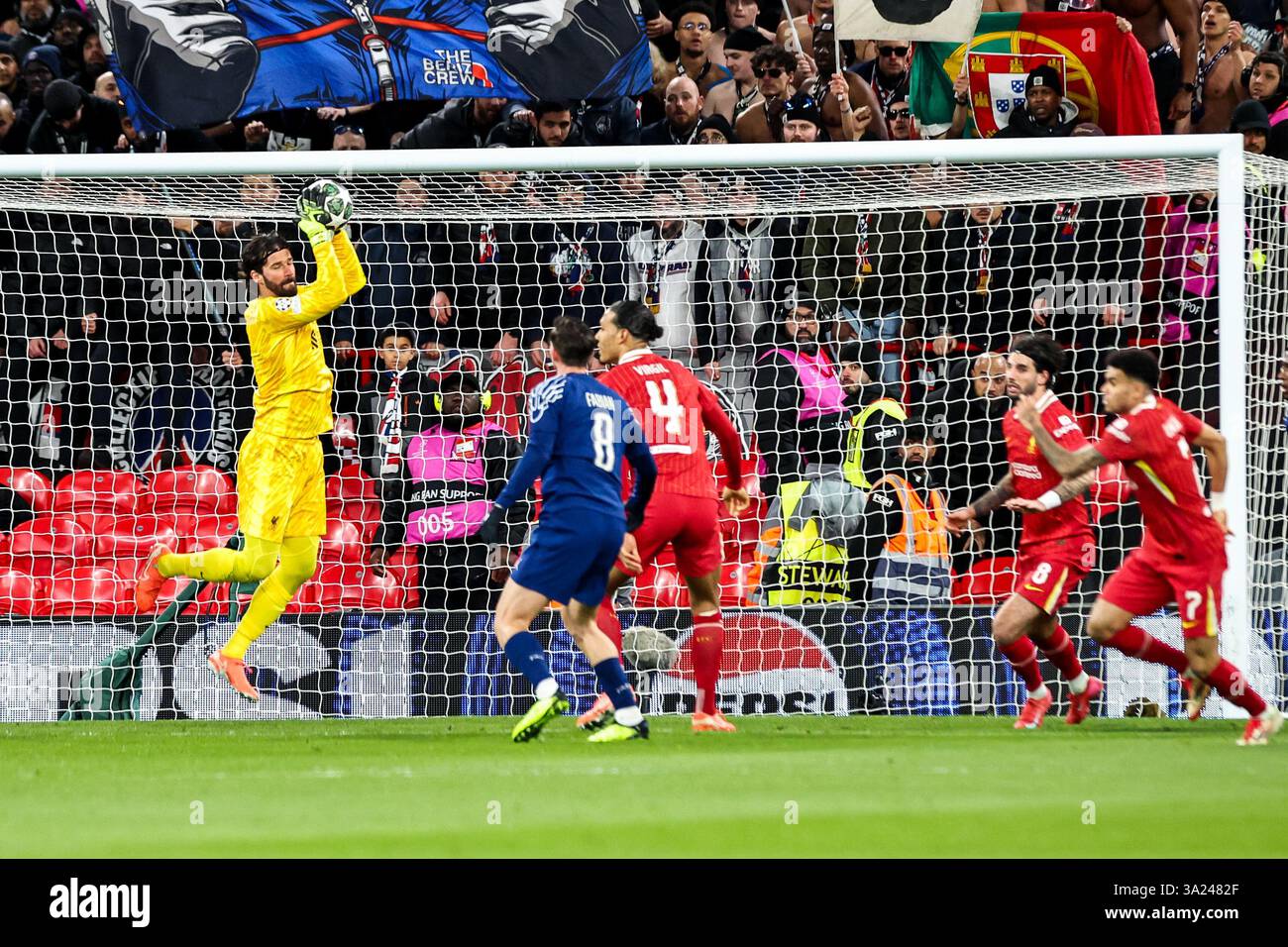 Alisson Becker of Liverpool makes a save during the UEFA Champions ...