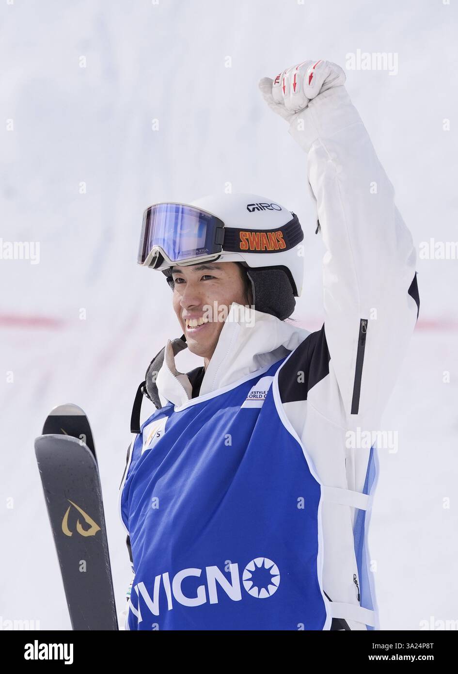 Japanese freestyle skier Ikuma Horishima reacts after winning gold in the World Cup men