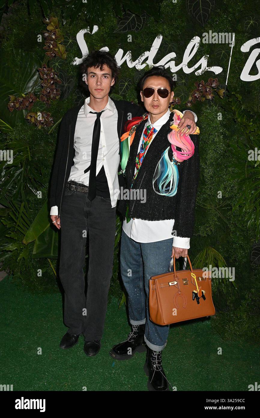 Andy Yu and Riley Boyd attend the Sandals Resorts 