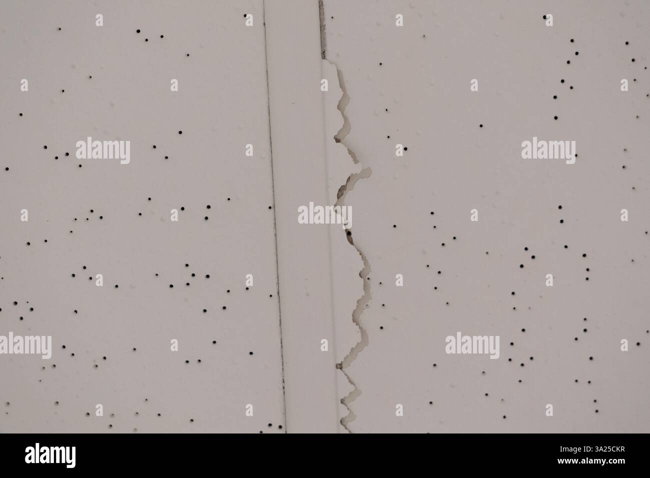 Cracks are seen in a ceiling at Smith Tower Apartments on Monday, March ...