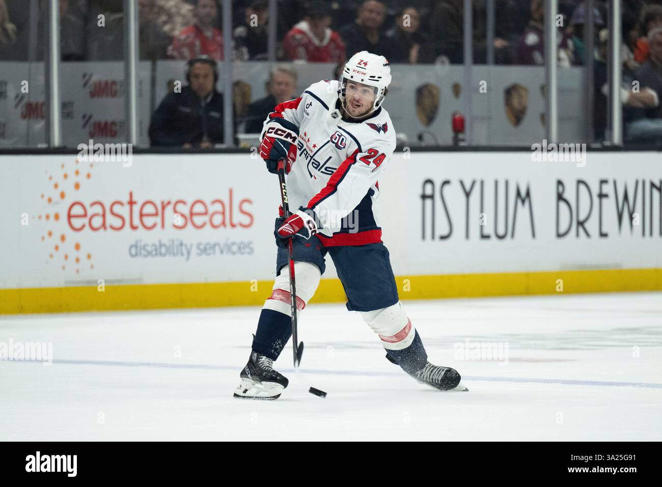 Washington Capitals center Connor McMichael (24) shoots during an NHL hockey game against the