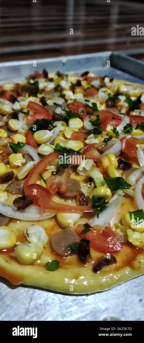 Italian Homemade Pizza Dough with toppings for delicious chewy crust - Smartphone Captured Stock Image