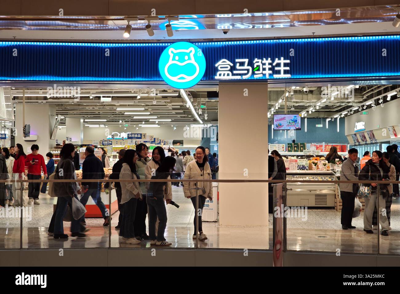 SHANGHAI, CHINA - MARCH 12, 2025 - Customers shop at a Freshippo store