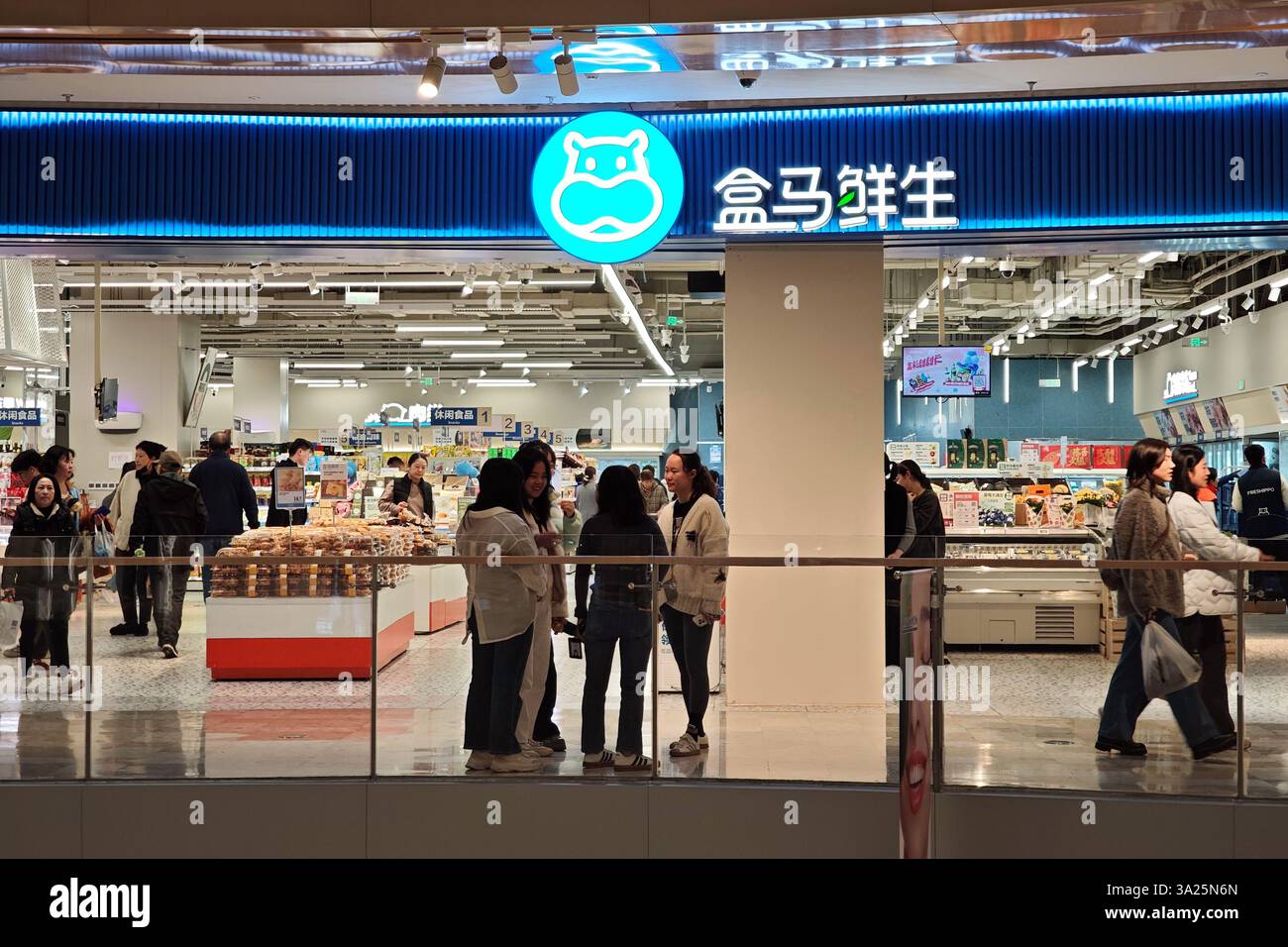 SHANGHAI, CHINA - MARCH 12, 2025 - Customers shop at a Freshippo store