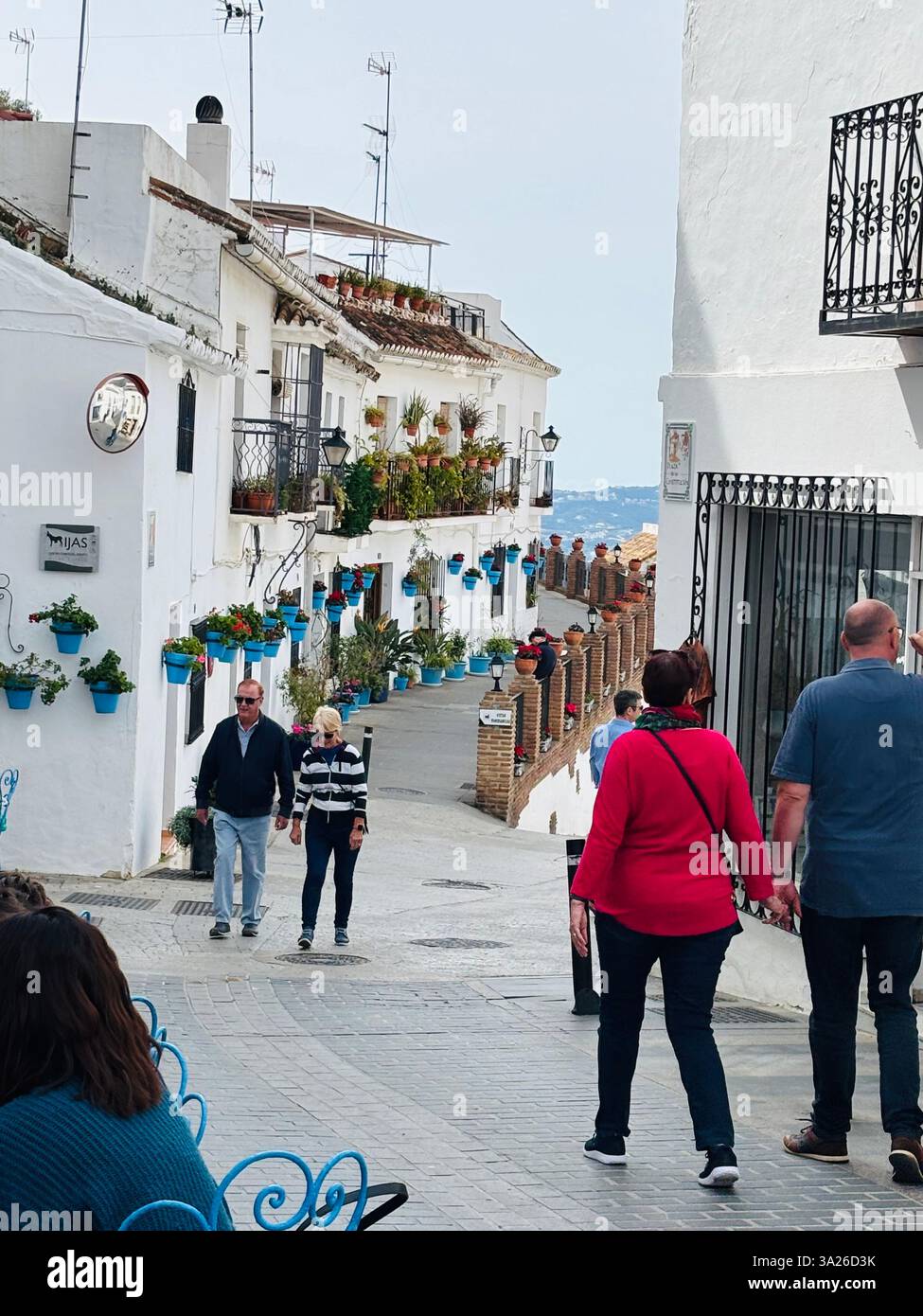 white washed walled street Mijas Pueblo - Smartphone Captured Stock Image