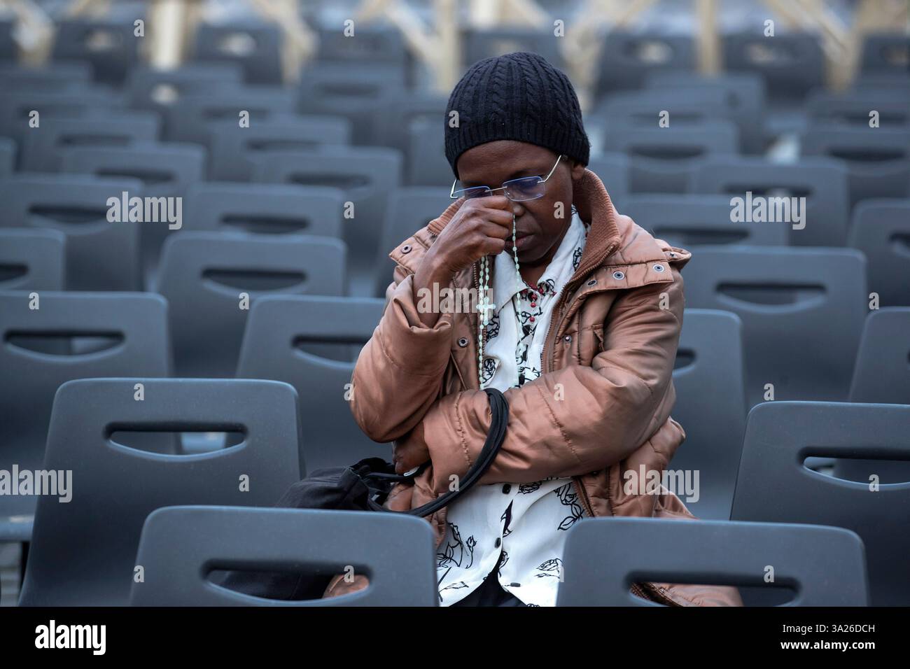 Vatican city, Vatican , 11 March 2025. Faithful pray during a rosary
