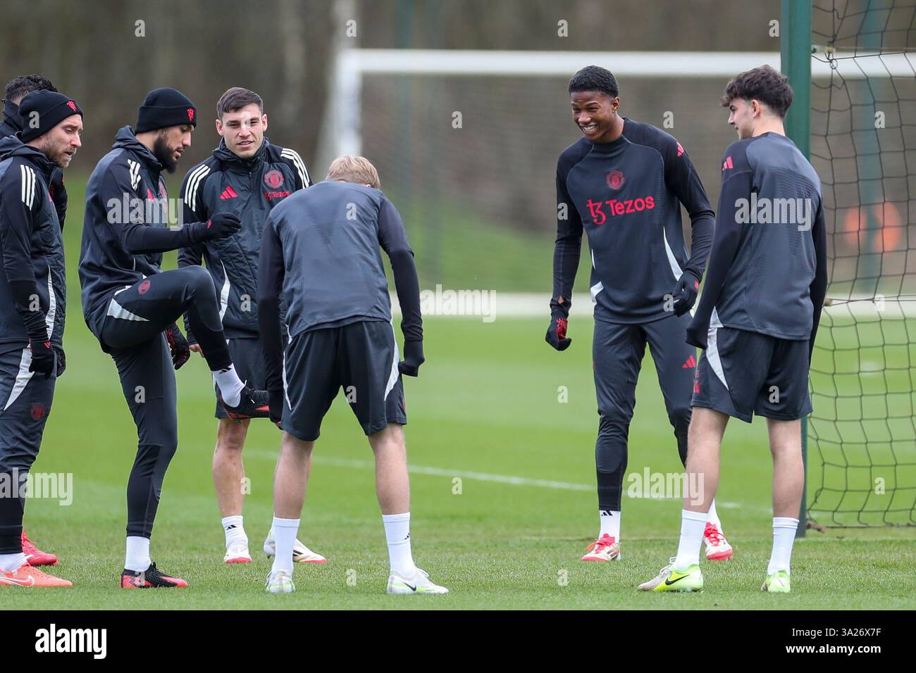 Manchester, UK. 12th Mar, 2025. Manchester United forward Chido Obi-Martin (56) Manchester United midfielder Manuel Ugarte (25) during the Manchester United Training session ahead of the UEFA Europa League Round of 16, 2nd Leg match vs Real Sociedad, Carrington Training Centre, Manchester, England, United Kingdom on 12 March 2025 Credit: Phil Duncan/Every Second Media Credit: Every Second Media/Alamy Live News Stock Photo