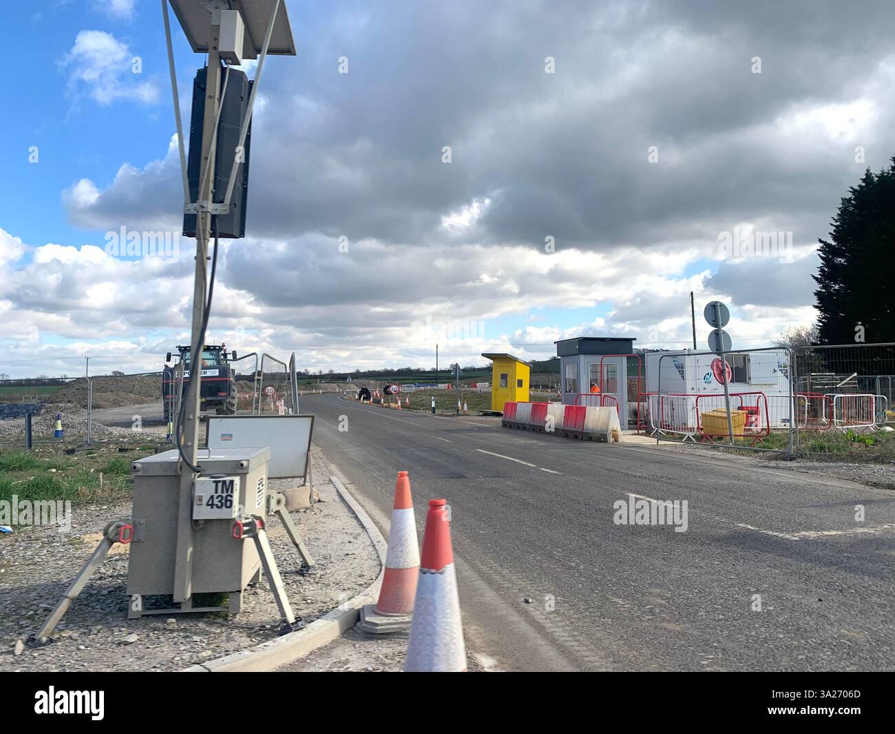 HS2 train track line electric electrical place new dig digging tracks fit Daventry Northamptonshire local digger Crain bollards bollard workmen fit - Smartphone Captured Stock Image