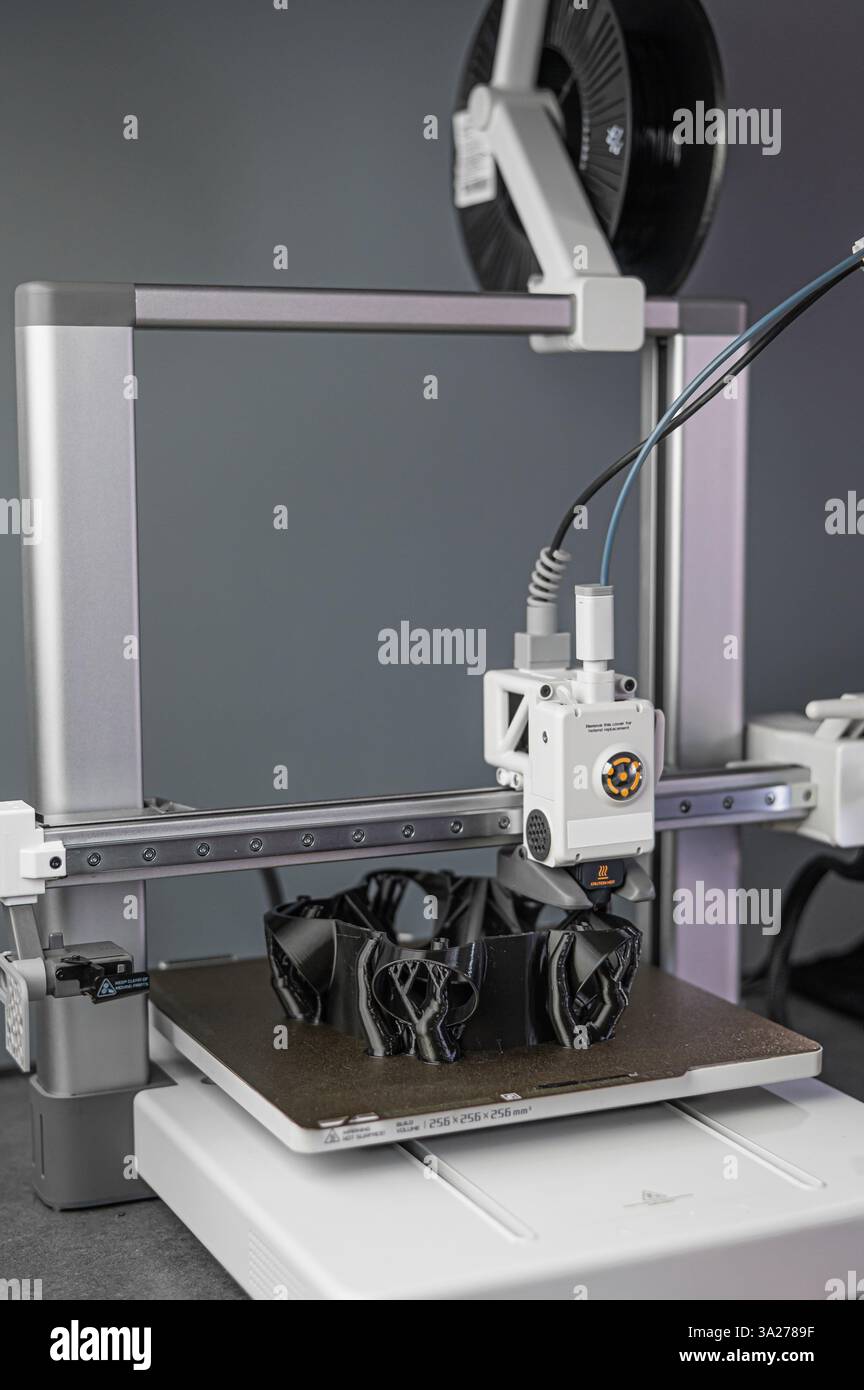 Modern 3D printer printing figure close-up Stock Photo