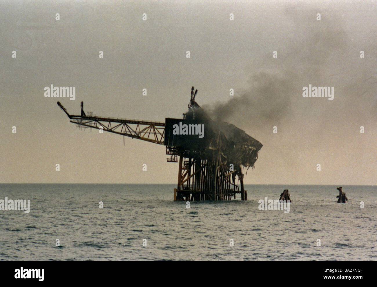 Piper Platform Thick smoke and flames rise from the remains of the Piper Alpha oil ...