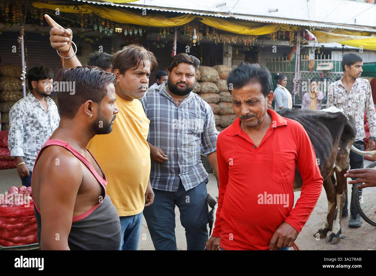 Men having an argument in the street in Rewa, Madhya Pradesh, India Stock Photo