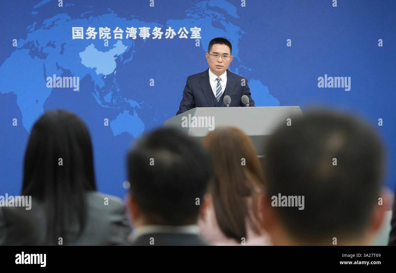 Beijing, China. 12th Mar, 2025. Chen Binhua, spokesperson for the Taiwan Affairs Office of the State Council, answers questions at a regular press conference in Beijing, capital of China, March 12, 2025. Credit: Chen Yehua/Xinhua/Alamy Live News Stock Photo