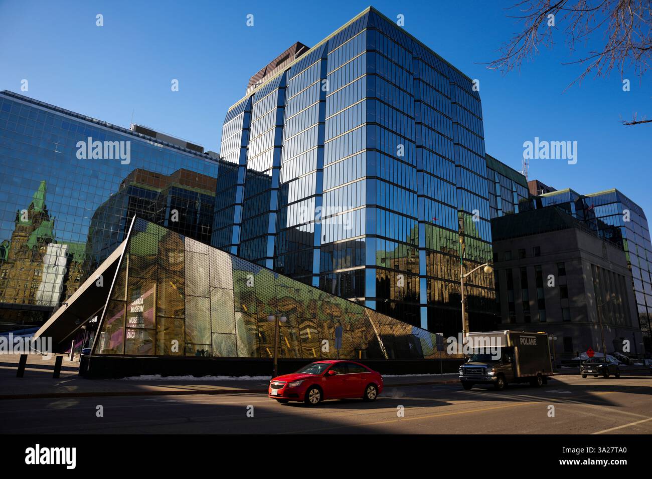 Traffic moves past the Bank of Canada building in Ottawa on Wednesday