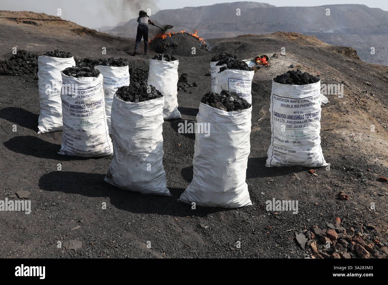 Coal mines of Jharkhand, India Sacks filled of coal by scavengers are ...