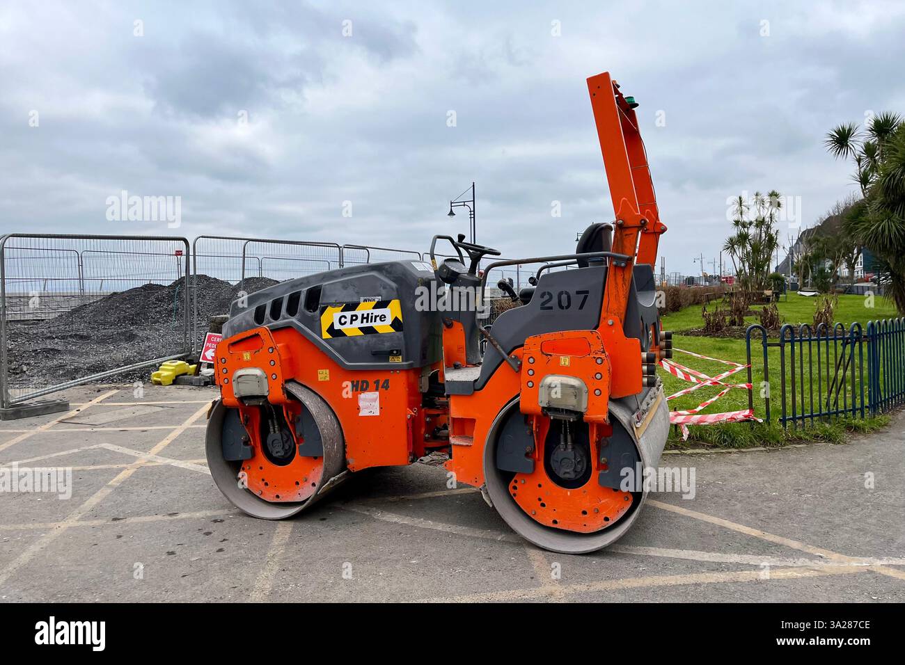 A Steamroller of the Mumbles Coastal Protection Project. Swansea, Wales, United Kingdom. 12th February 2025. - Smartphone Captured Stock Image