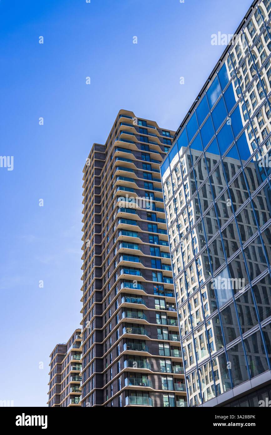 High rise apartment buildings and reflective glass structures in urban ...