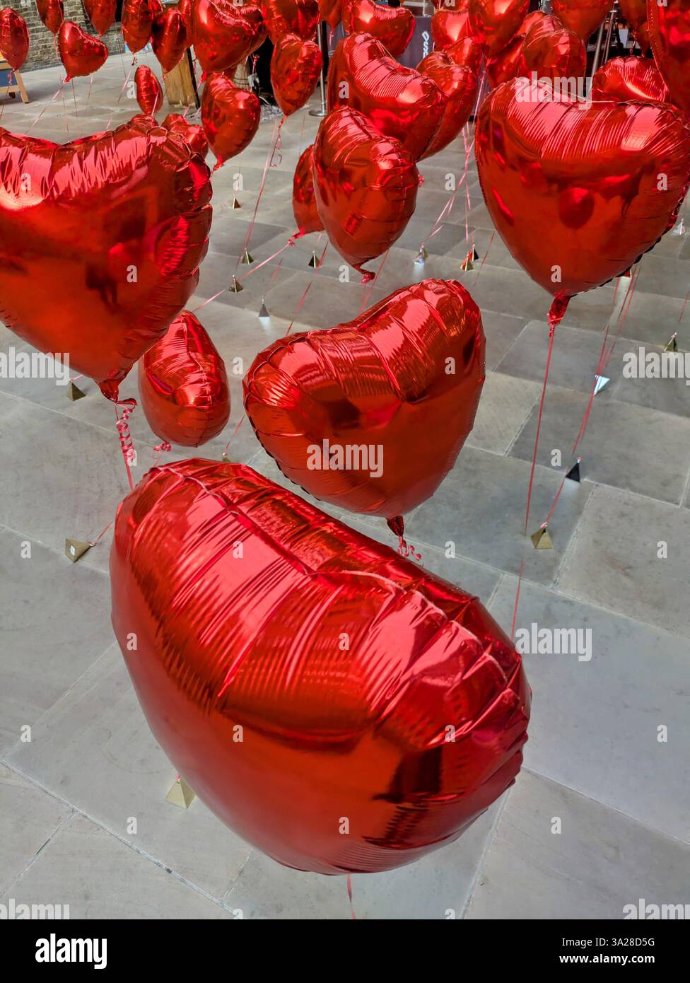 many heart balloons in devonshire square london Stock Photo