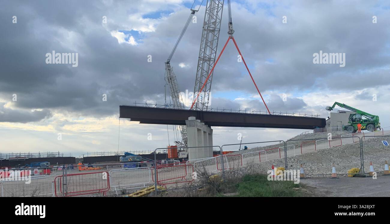 Electric electrical HS2 crane building road bridge Northamptonshire Daventry line blocks weather men man workmen large scale building tunnel - Smartphone Captured Stock Image