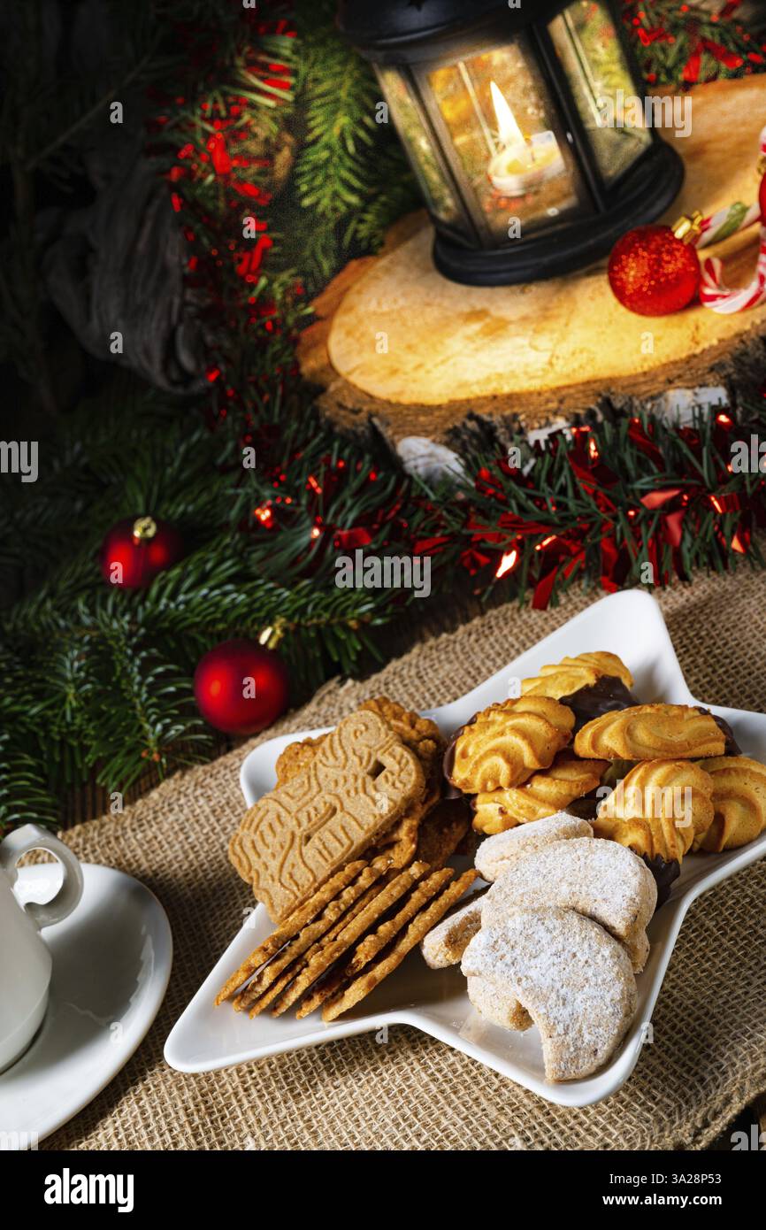 Different types of biscuits with rustic Christmas decorations Stock Photo