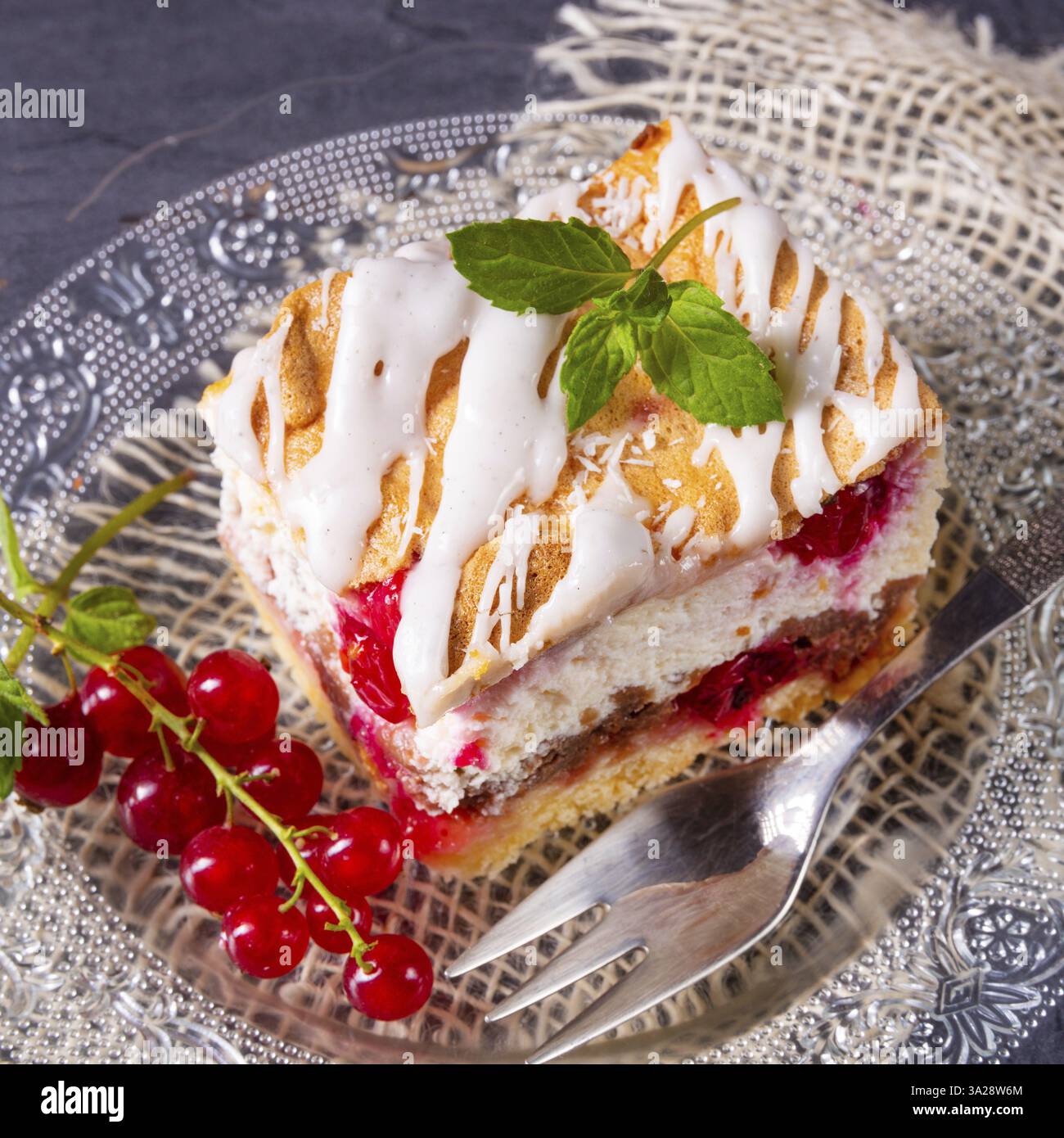Cheesecake with meran and redcurrants Stock Photo