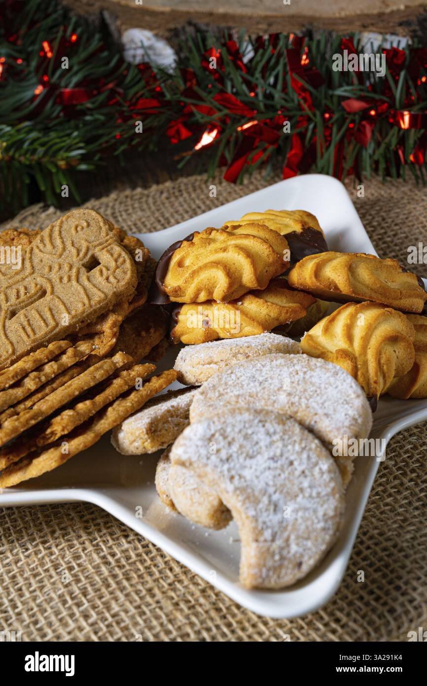 Different types of biscuits with rustic Christmas decorations Stock Photo