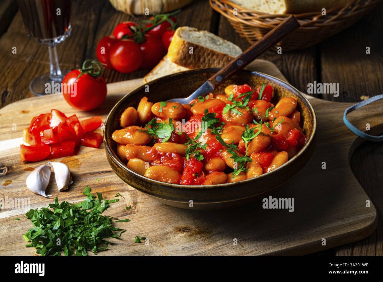 Rustic giant beans with fresh tomato sauce Stock Photo - Alamy
