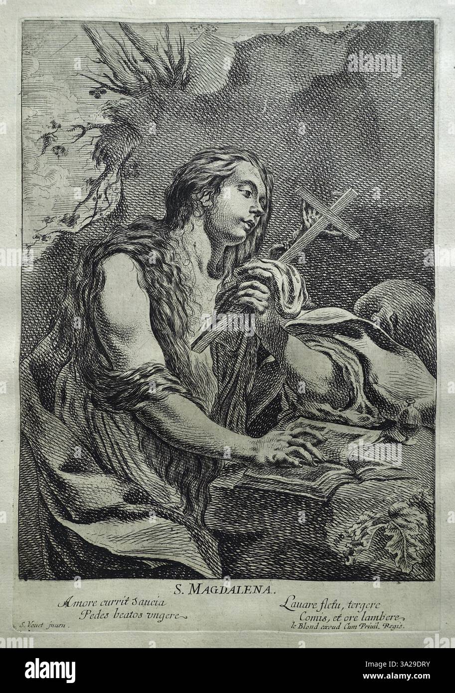 St. Mary Magdalene is shown in the desert, praying and holding a cross ...