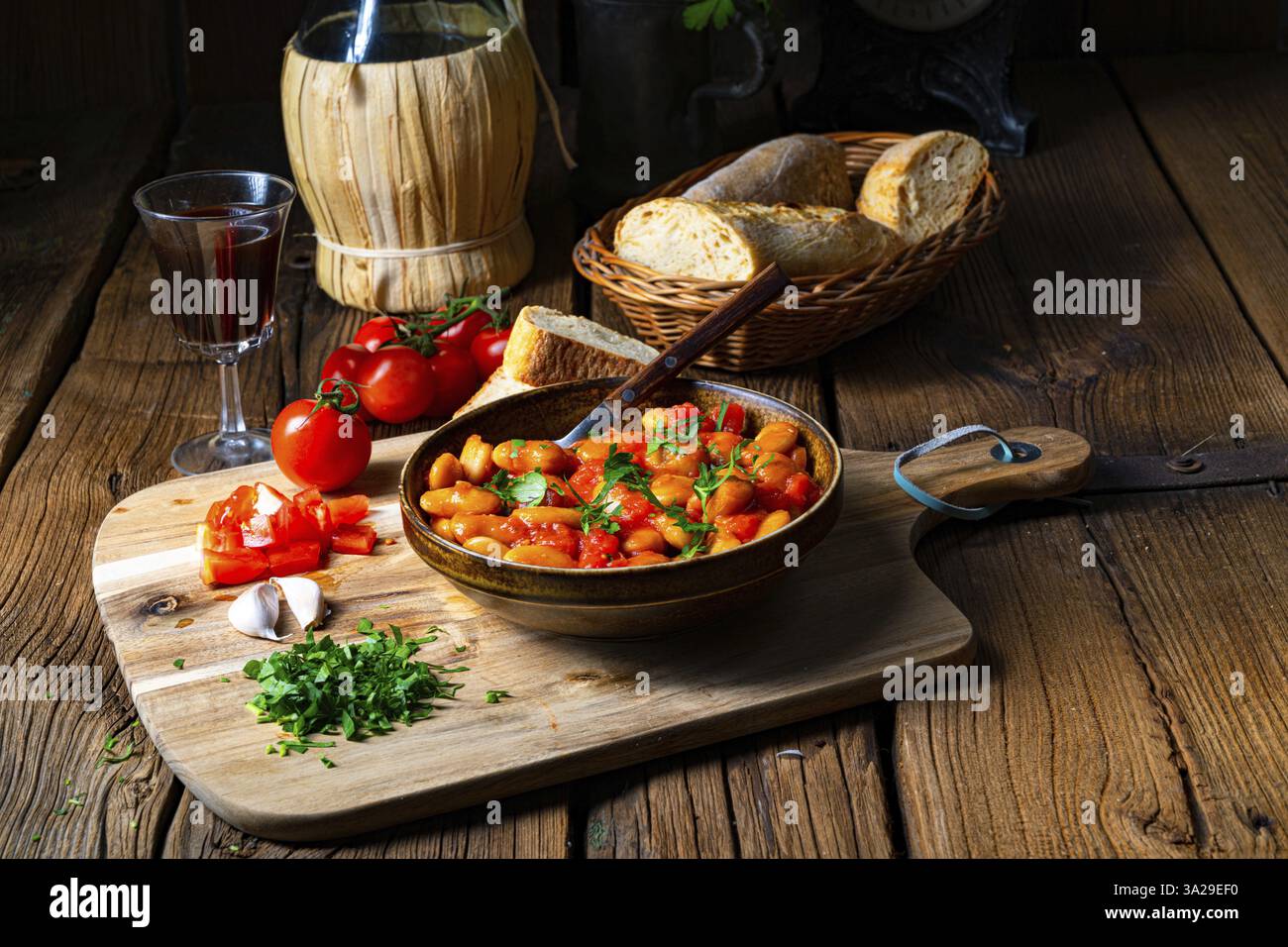 Rustic giant beans with fresh tomato sauce Stock Photo - Alamy
