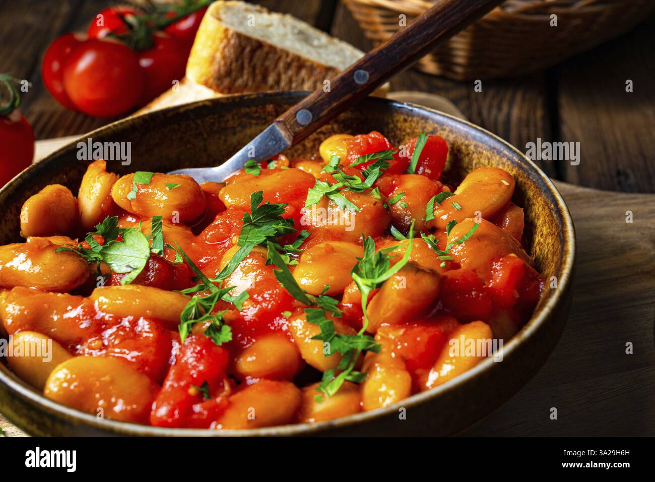 Rustic giant beans with fresh tomato sauce Stock Photo - Alamy