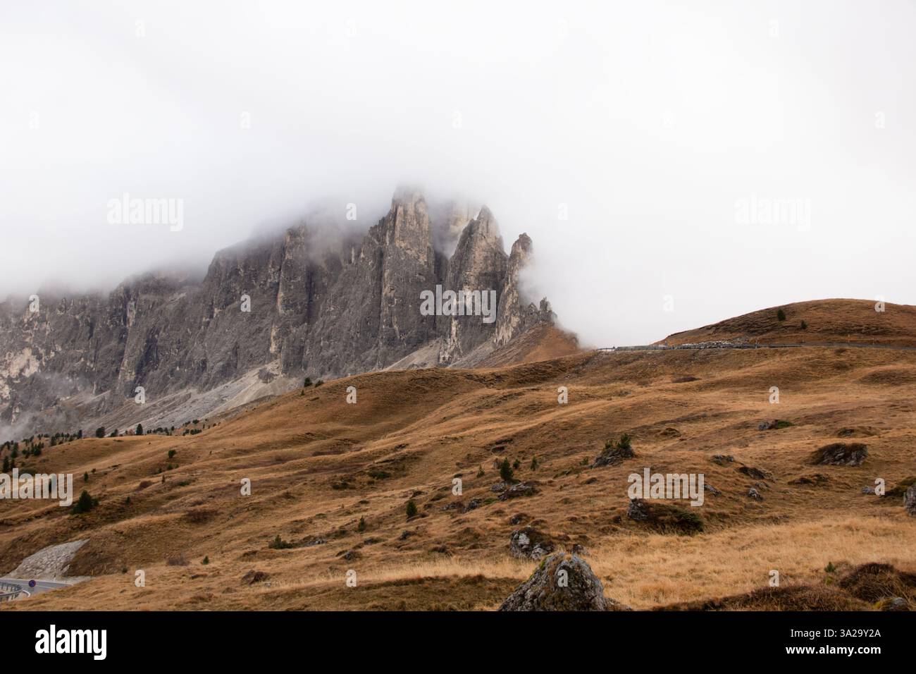 Dolomites at fog Stock Photo - Alamy