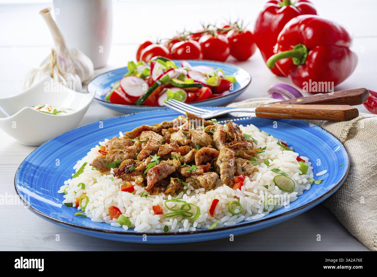 Gyros with rice, green salad and tzatziki Stock Photo - Alamy