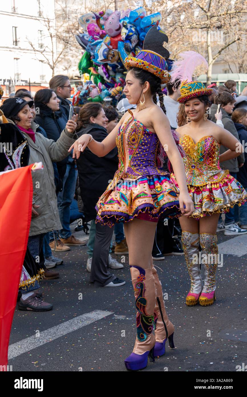 Vibrant costumes and lively dancers grace the streets during Paris ...