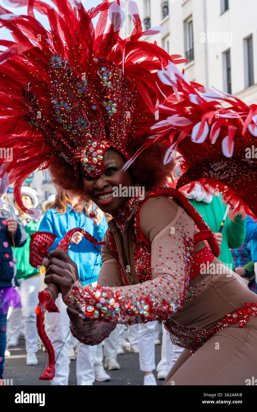 Colorful performers celebrate Paris Carnival 2025 with vibrant costumes ...