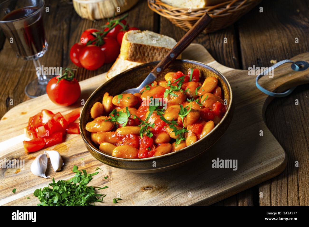 Rustic giant beans with fresh tomato sauce Stock Photo - Alamy