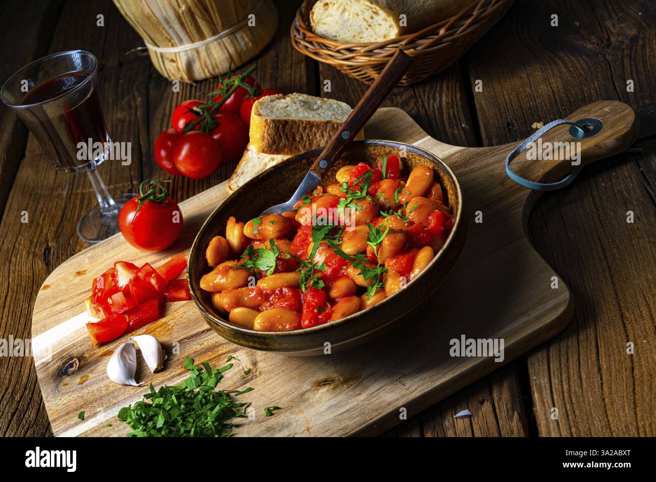 Rustic giant beans with fresh tomato sauce Stock Photo - Alamy