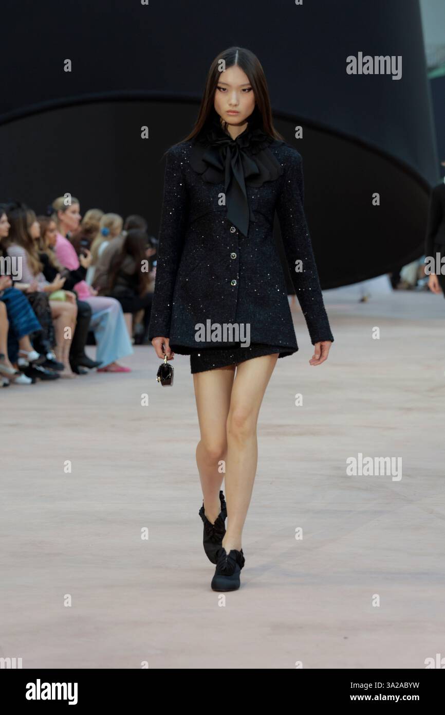 Model Tinglei Liu walks on the runway during the Chanel Ready to Wear ...