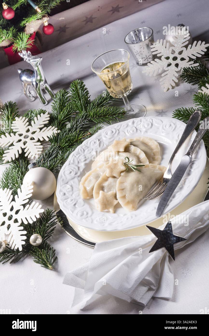 Polish-style dumplings filled with sauerkraut and mushrooms Stock Photo