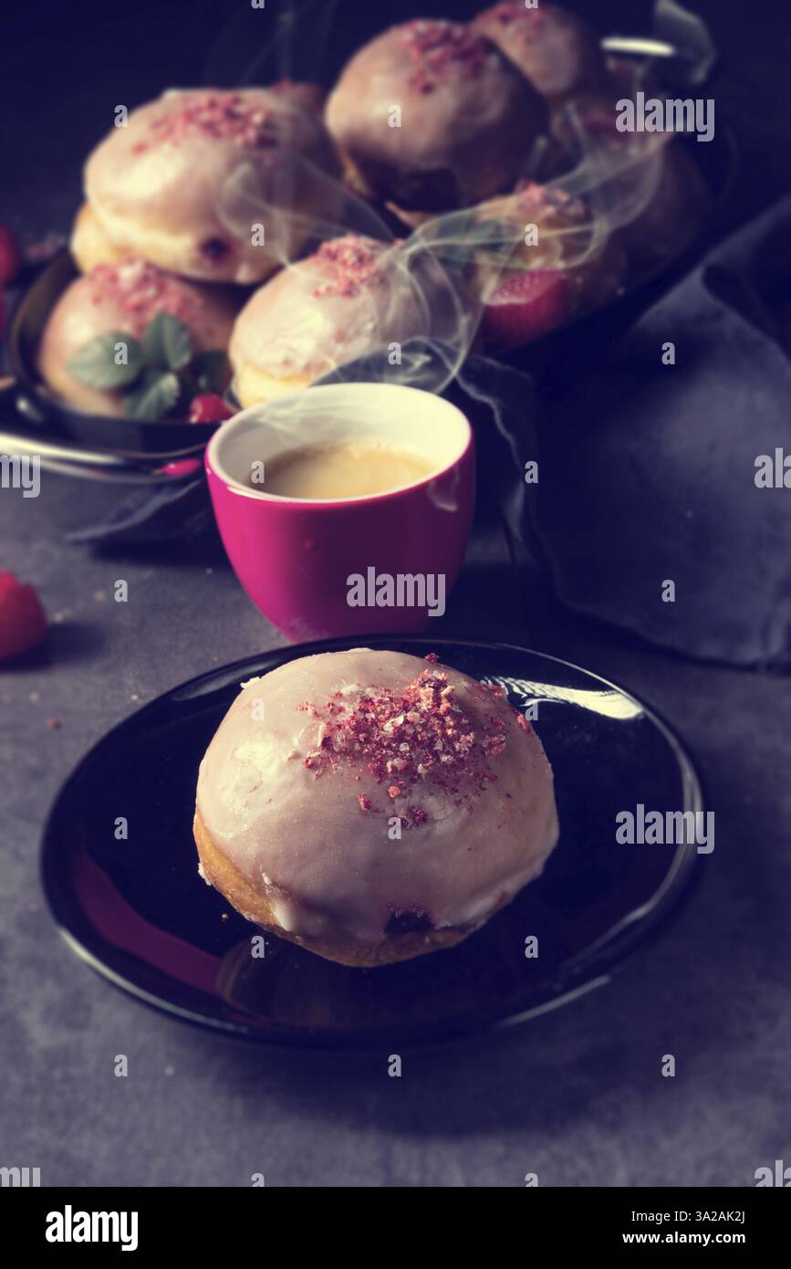 Delicious Berlin donuts filled with raspberry jam Stock Photo - Alamy