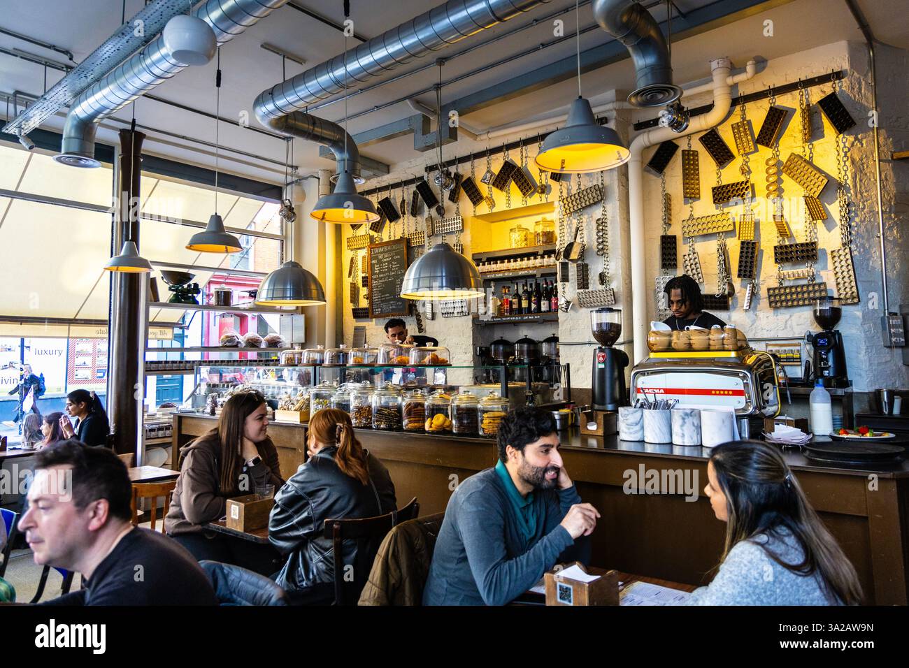 Rustic and industrial interior of Italian Bear Chocolate, Tottenham Court Road, London, England Stock Photo