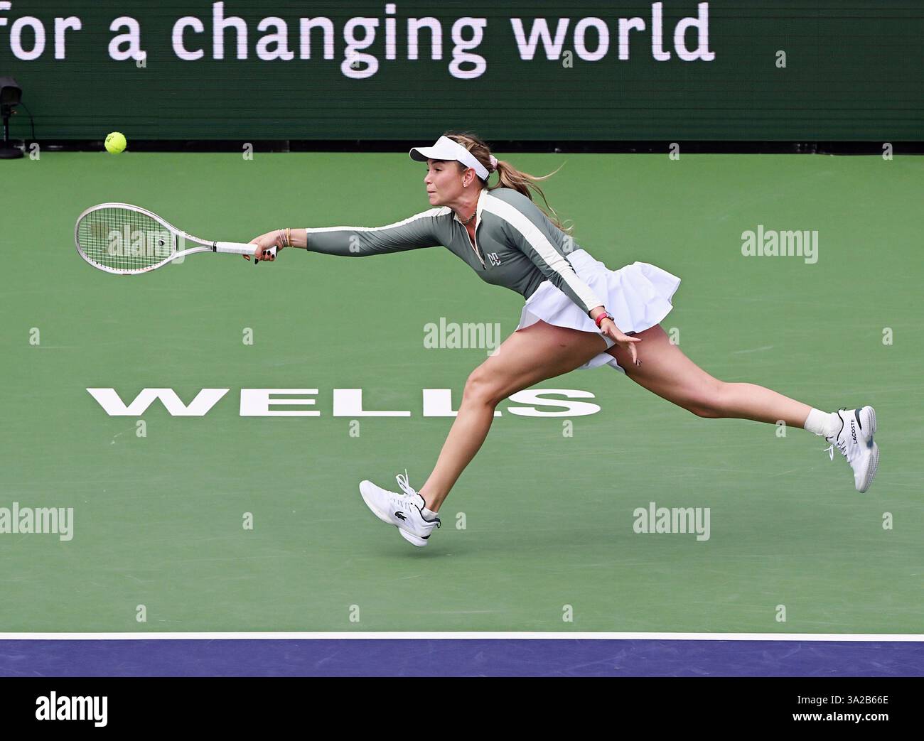 INDIAN WELLS, CA - MARCH 12: Donna Vekic (CRO) chases the ball during a ...