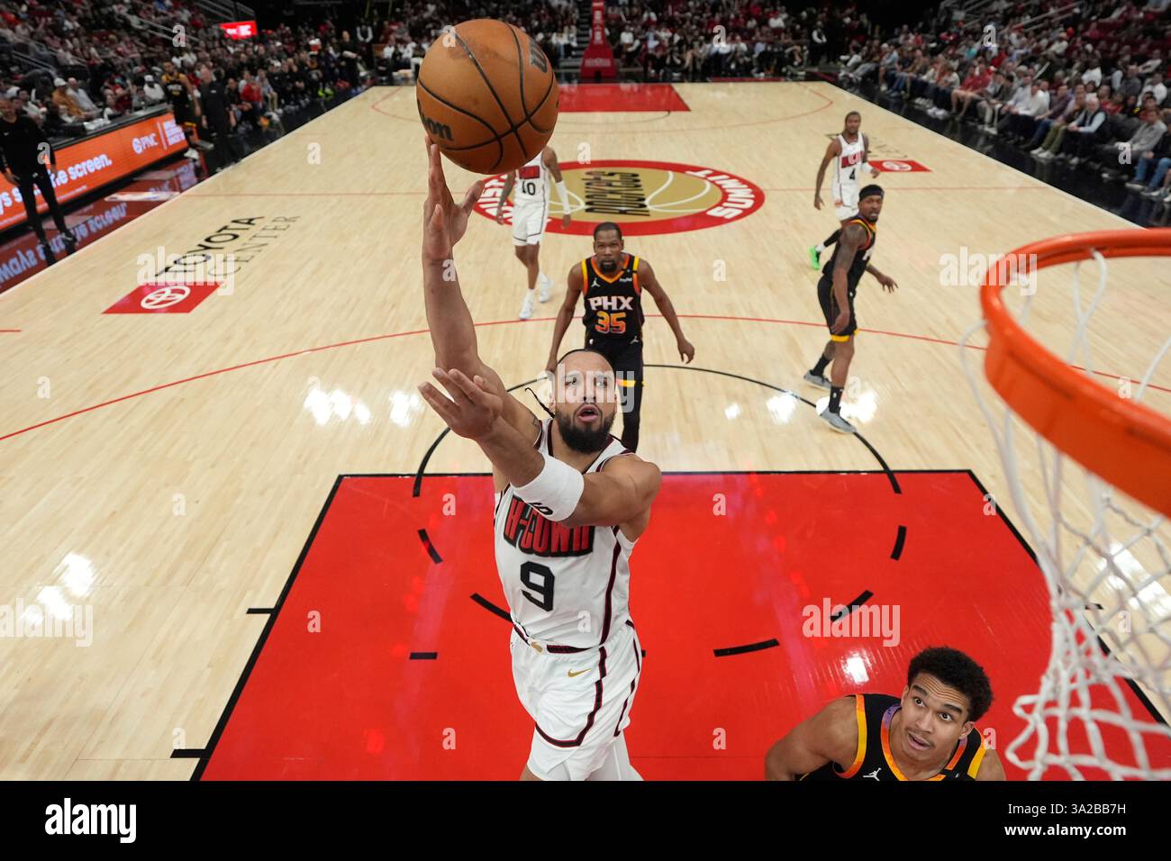 Houston Rockets' Dillon Brooks (9) shoots against the Phoenix Suns ...