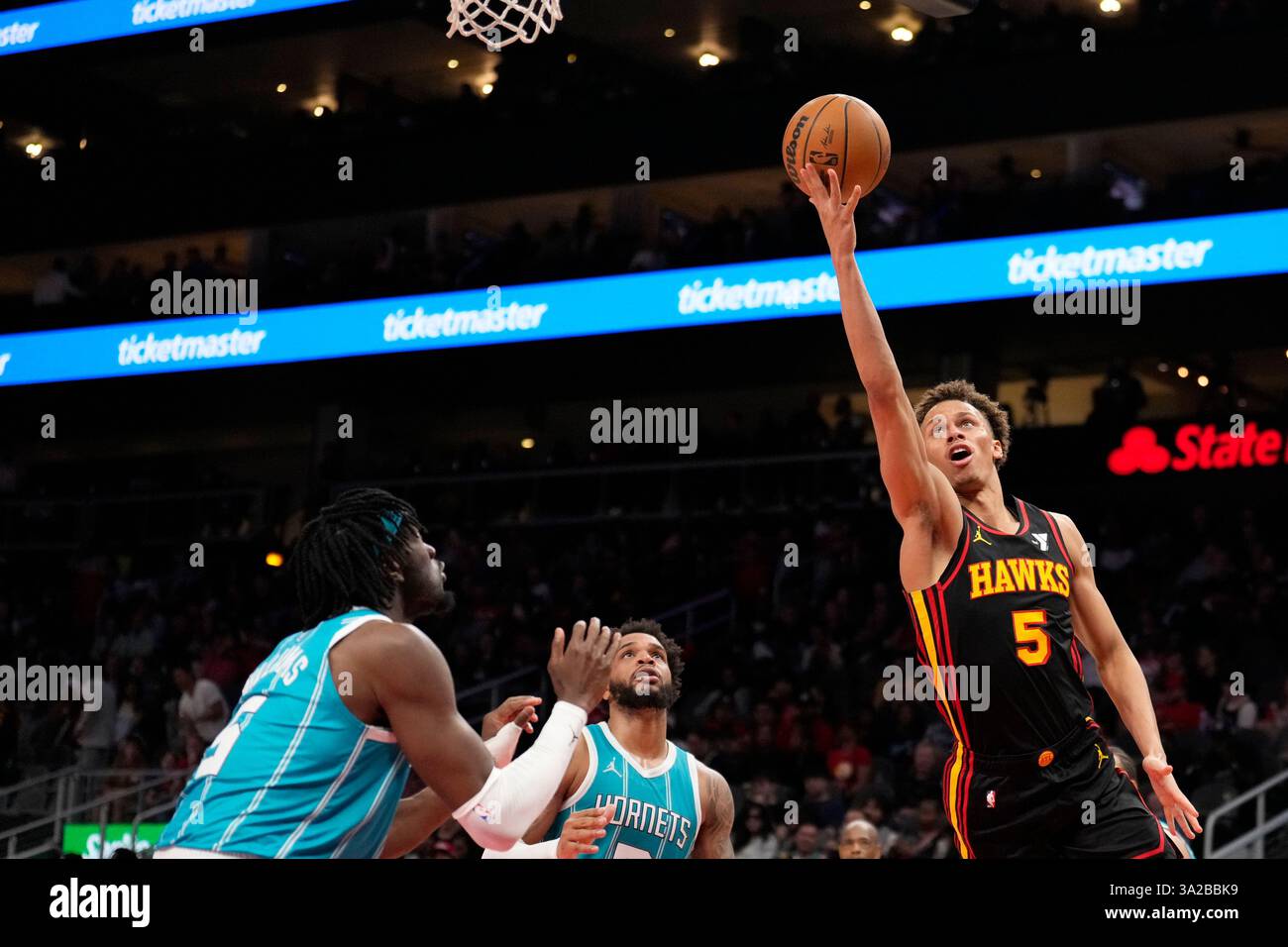 Atlanta Hawks guard Dyson Daniels (5) shoots the ball in the second half of an NBA basketball