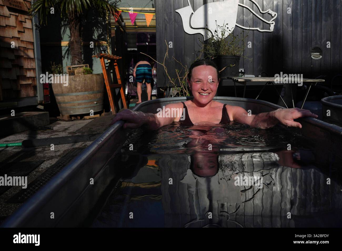 Ella Price enjoys her sauna session at the Hackney Wick Community Sauna Baths, in London