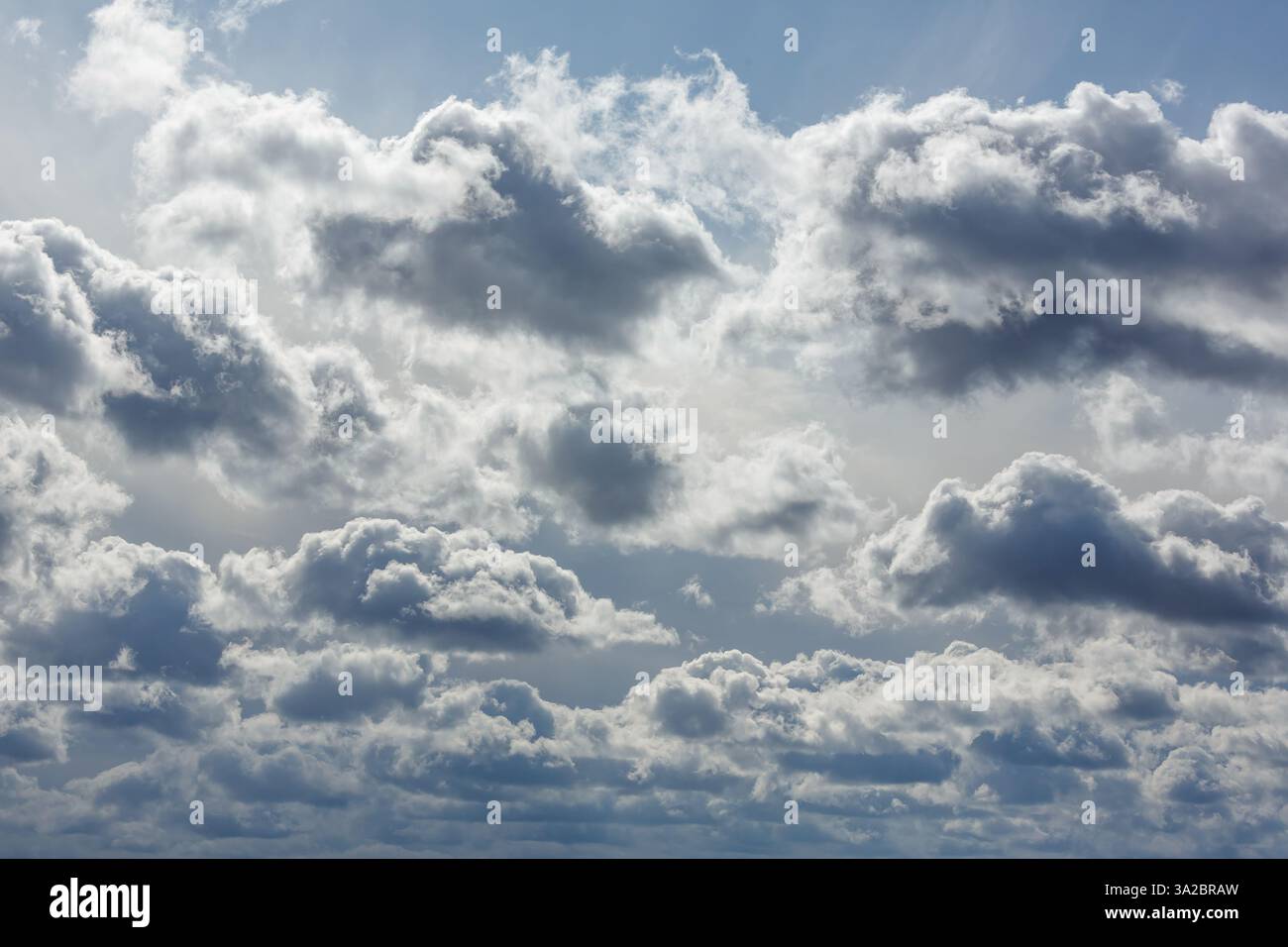A sky filled with dark and light clouds creating a dramatic and